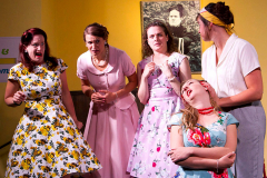 FIVE LESBIANS EATING A QUICHE